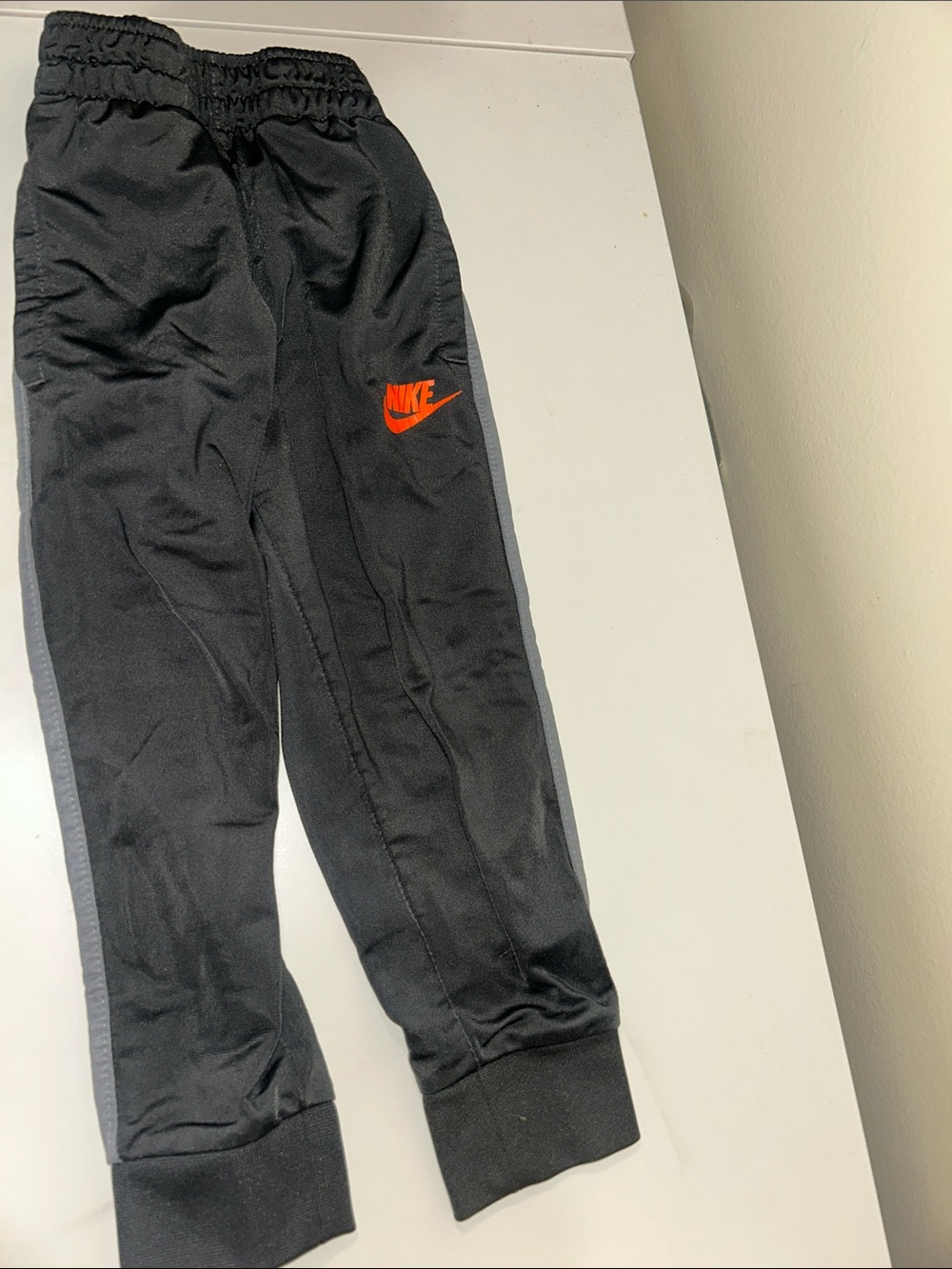 Nike Black Joggers with Orange Logo